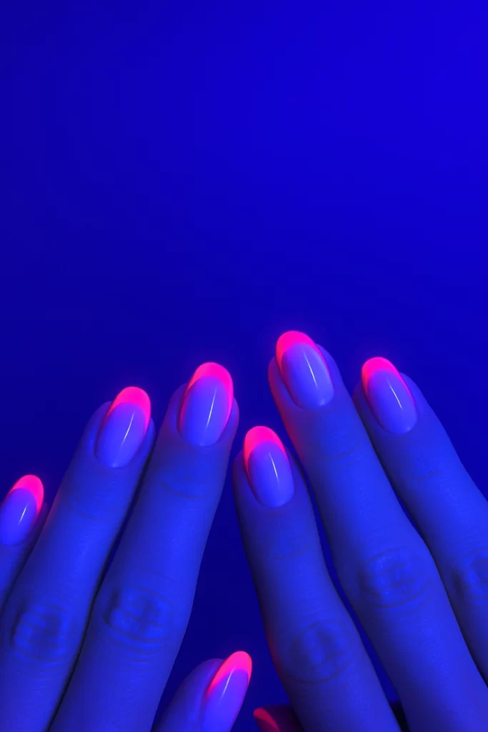 Neon French tip with gel polish under UV light, Gel Lac Neon Glowing design