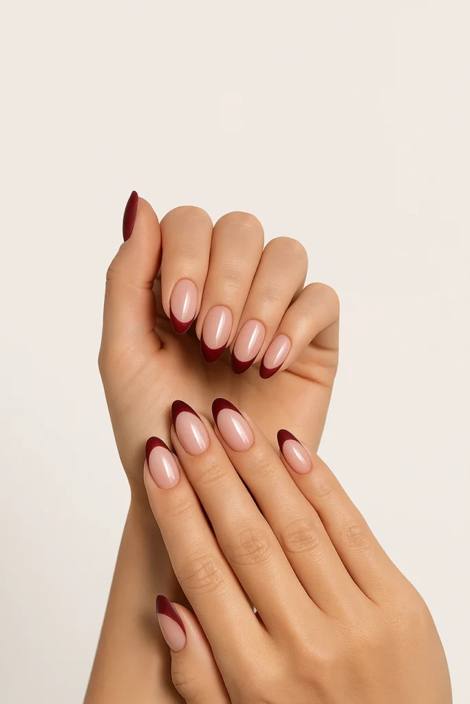 oszi-koromtrendek-4 fall nail trends – almond nails with reinvented French manicure, burgundy tips, clean backdrop