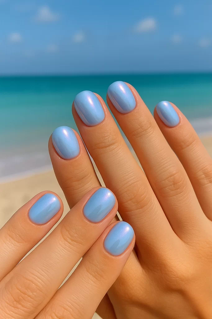 Pastel baby blue short nails with chrome shine